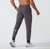 LL Pantaloni lunghi da jogging da uomo Sport Yoga Outfit Quick Dry Coulisse Palestra Tasche Pantaloni sportivi Pantaloni Uomo Casual Elastico in vita fitness 2024 A22