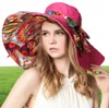 Zonhoeden voor vrouwen zomer grote strandhoed bloem bedrukte brede rand hoeden dames elegante hoeden meisjes vakantie tour hoed accessoires1205792