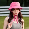 Brede rand hoeden emmer hoeden Japanse schattige veter dames caps lente en zomer buiten zonnebrand sunshade Koreaanse veelzijdige brede bakmak hoedensl231221