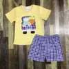 Set di abbigliamento Boutique all'ingrosso Pasqua Cartoon stampato maniche corte Set per bambini per ragazzi e ragazze
