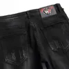 Jeans pour hommes printemps automne 2023 déchiré noir mode crâne broderie pantalon slim stretch vêtements de moto