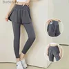 Set attivi Pantaloncini sportivi finti in due pezzi Pantaloni da yoga Stretti da donna Vita alta Elastico Hip Lift Piccolo piede Fitness Quick Dry Running PocketL231221