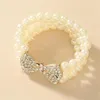 Bracelet de perles d'imitation multicouches baroques, en métal doré, avec nœud en strass, breloques, accessoires de bijoux de fête, 1263c, nouvelle collection Bracelets pour femme
