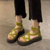 Buty Dress Designer Sandals Platforma Platforma obcasy damski w stylu rzymskim w stylu rzymskim gęstym solowym letnim krzyżem krawat plażowy sandalias mujer