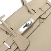 70 % Factory-Outlet-Rabatt Silberne Schnalle, große Kapazität, tragbare Damen-Oberschicht-Rindsledertasche mit Litschi-Muster im Angebot