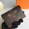 Designerkarte Wallet Woman Echtes Lederbrauner Blumen Mehrere Stile Luxusbeutel Cowhide Futter Original Leder Klassische hochwertige Reisekartenbeutel Geldbörsen