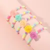 Strand Bohemian Buntes Acryl Perlen Armband handgefertigtes elastisches Seilblumen Daisy Anhänger Armbänder für Mädchen Prinzessin Baby Schmuck