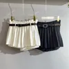 Юбки 2023 Весна/летняя ремень дизайн брюк ощущение универсальной a-line белая плиссированная наполовину юбка Женщины