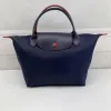 Luxurys Dumpling Tote Dükkanı Hobo Tasarımcı Çanta Seyahat Çanta Çantası Debriyaj Naylon Pochette Pembe Omuz Çantası Kadınlar Crossbody City Gym Tatil Büyük Duffle Beach Bags1