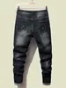 New men's ultra-thin jeans with torn tassel holes and elastic paint spray black stitched beggar pants men's designer jeans 231222