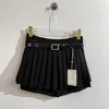 Saias 2023 Projeto de calça de primavera/verão Design da faixa versátil A-linha A-linha plissada de meia saia Mulheres