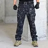 Jeans maschile maschili da uomo pantaloni caldi pantaloni sciolti pantaloni di cotone dell'esercito camuffato tattico da campeggio da campeggio da campeggio pantaloni cargo J231222