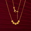 Coulages de colliers de perles chanceux de couleur d'or pure 24 km