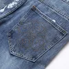 Jeans micro-flaudados lidosos calças de costura impressas de jeans com estampa azul de primavera outono de calça denim bordada no meio da cintura