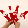 60 PCS Świąteczne poklepanie bransoletki koło Zatrzymaj świąteczny prezent dla dzieci Święty Święty Snowman Deer Year Party Toy Dekoracja nadgarstka 231221