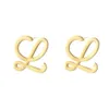 Boucles d'oreilles Lowee Designer Femmes de qualité originale Charme d'oreilles lisses pour la mode pour femmes Luxurage haut de gamme Oreilles polyvalent et simple