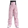 Couples Pantalons de ski d'hiver Men de qualité Femme Produit de qualité Vent étanche Imperméable Ice à glace Snow Snowboard Taist Protection 231221