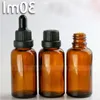 440pcs/lotto da 1 oz bottiglie da contagocce rotonde all'ingrosso da 30 ml con 5 tappi per gli stili per Eliquid Eliquid da 30 cc