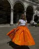 Kjolar casual orange satin kjol midi fotled längd kvinnor skräddarsydda kläder a-line rufsled vestidos para mujer elegantes