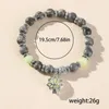 Stron à la mode simple Naturel Stone Stripe Map Glow Lotus Bracelet Gemstone Perles