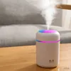 Humidificateurs Mini humidificateur coloré et diffuseur d'aromathérapie - Utilisation à la maison et en voiture - Alimenté par USB - Humidificateur à lumières rotatives multicolores