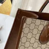 Kuqis nya Cowhide Tote Shoppingväska Singel axel Crossbody Handväska Samma stor kapacitet för män och kvinnor Factory Online 70% försäljning