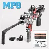 MP9 TOY GUNS Electric Foam Dart Blaster Gun Soft Bullet Submachine Guns大人のための自動アルマ