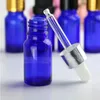 10 ml essentiële olieklasflessen met druppel blauw E vloeibare cosmetica flacon met gouden zilveren zwarte dop ekvns