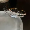 Luksusowa marka błyszcząca cyrkonowa węzeł otwarte bransoletki dla kobiet Wysoka jakość pełna geometrii prezenty biżuterii 231221