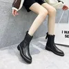 Botas de cuero de diseño para mujeres de doble letra