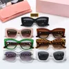 Luxury Lunettes de soleil Designer MM Top pour femme et homme de couleurs de couleurs de chats Lunes Eyes American Multi Color Extérieur lunettes de lunettes avec boîte d'origine