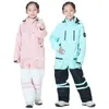 Macacão infantil menino ou menina neve terno de neve capa de esqui para esqui a esportes esportivos à prova d'água à prova d'água de snowboard 231221