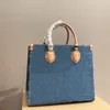 23fw designer Donne donne in pelle borse da guscio di cuoio onthgo di alta qualità in denim blu borse blu sacca per la spesa del corpo Luxurys Messenger Travel Borse da viaggio 35 cm