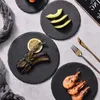 丸いブラックディナープレートデザート寿司クリエイティブ食器バーベキューヨーロッパと米国