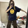 Designer t shirt män tshirt mens kvinnor kläder retro personlighet bokstav smiley ansikte tryck mode andningsbara lösa t-shirts topp sommar tshirts