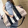 Torebka z torbą z torbą w kratę Kobiet na ramię duża pojemność wodoodporna na zewnątrz nylon sportowy Kobieta Crossbody 231221