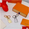 Llavero de llave del llavero de moda Diseñador de lujo Sier Gold Metal Hebilla Hebilla Classic Letter Pendse Keychains de alta calidad Mochila ORN DHFJI