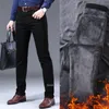 Zimowe męskie polarowe ciepłe dżinsy klasyczny styl biznes swobodny zagęszcza regularne spodnie dżinsowe black blue marki spodnie 231221