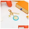 Key Rings Stijlvolle sleutelhanger luxe designer toetsen hanger gouden ring sleutel klassieke letter groothandel hoge kwaliteit sleutelhangers tas orna dhkmj