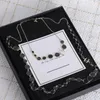 Fashion Fashion Womens Oree Oreing Designer Sweater Chain Bijoux Black Gems Pendants Roundants Stud Classic Lrass Luxe Open Collier Romantique Boucle d'oreille Romantique pour femmes Cadeaux de fête