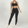 Ensembles actifs 2024 1 / 2pcs V arrière Lycra Pocker Pocket Halter Sport Bra Yoga Set Proof Proof Scrunch Legging Workout Pant Gym Fitness Costumes