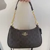 2023 corrente feminina versátil axilas luxo flor antiga portátil um ombro crossbody saco verão novo 3641