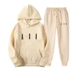 Fashion Tracksuit Mens Hoodie Designer pantalon Men Femmes Femmes Coton Lettres imprimées Sweet Sweat Casual Loose Simple Sweet Sweatpants Two-Piece Set