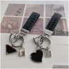 Keychains Lanyards Fashion Triangle Keychain paar hartvorm fit mannen dames hoge kwaliteit schapenvacht ontwerper sleutel buckle drop deli dhpwi