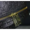 Bolsa de mochila de la marca de diseñador Mujeres Ligeros y de moda Patrón impreso completo Mochila de cuero genuino para mujeres 26*14*32cm
