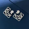 Dingle ljuskrona europeiska och amerikanska personliga högkvalitativa smycken nya high-end fyrkantiga geometriska mönster överdrivna örhängen ljus lyxguldörhängen
