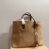 Nova sacola clássica de 4 cores, designer famoso, versátil, durável, de lona, para mulheres e homens, bolsa universal para encontros, compras, compras e turismo, 40 cm