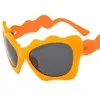 Lunettes de soleil de mode Femmes vagues Sun Glasse anti-UV Spectacles Cat Eye Eyeglass Personnalité Cadre surdimension