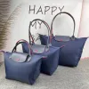 Luxurys Dumpling Tote Dükkanı Hobo Tasarımcı Çanta Seyahat Çanta Çantası Debriyaj Naylon Pochette Pembe Omuz Çantası Kadınlar Crossbody City Gym Tatil Büyük Duffle Beach Bags1