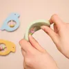 Bird Shape Baby Rattle Silicone Color Cartoon Tanding Safe Food Grade Barn Molar Toy Spela Gym Brain Game 231221